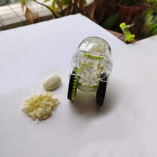 Load image into Gallery viewer, Roller Garlic Press